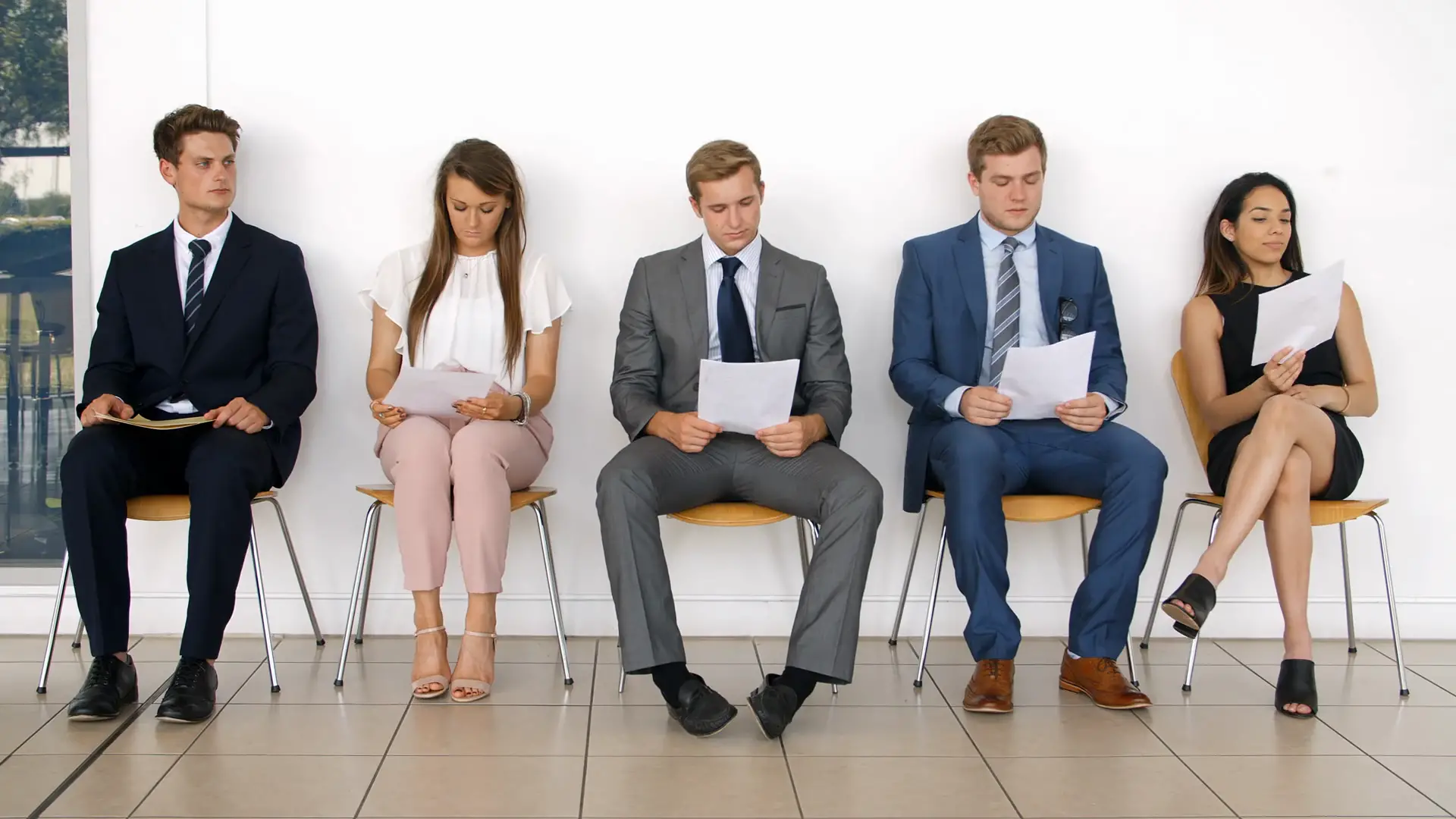 Group Of Job Candidates Waiting For Interview In Office ...